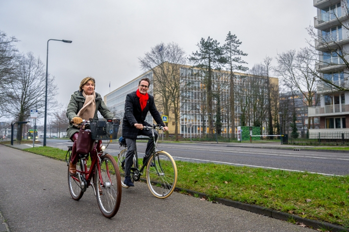 Annetje Ottow and Peter Heijkoop cycle from one site to the next.